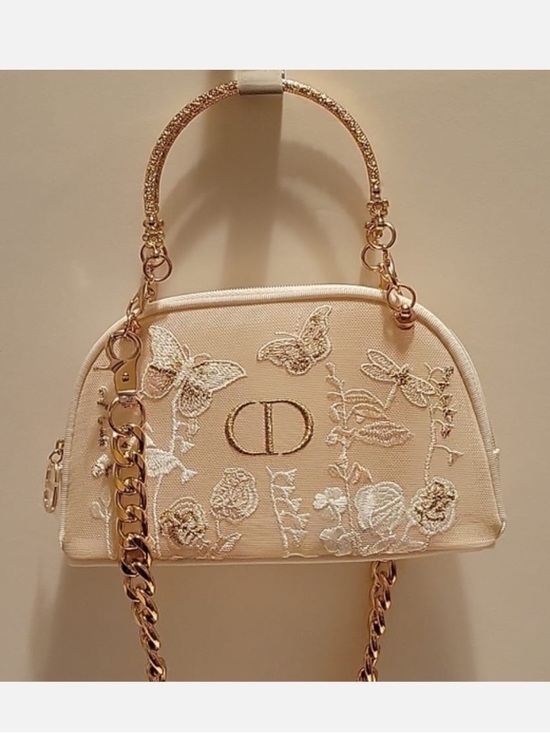 Dior Handbags - Dior Pouch in Cream with Gold
Accents